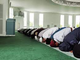 How many times Muslims pray a day?